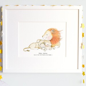 May include: A white frame with a white mat and a print of a lion with two cubs. The print says "Baby Joshua Lots of love from Mummy and Daddy".