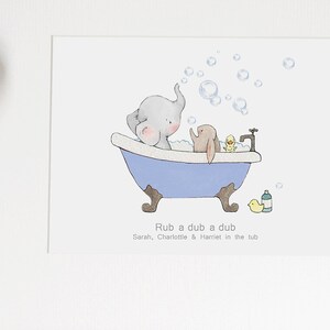 May include: A cute illustration of an elephant and a rabbit taking a bath in a blue bathtub. The elephant is blowing bubbles and the rabbit is holding a yellow rubber duck. The text "Rub a dub a dub" is written below the image, followed by "Sarah, Charlotte & Harriet in the tub."