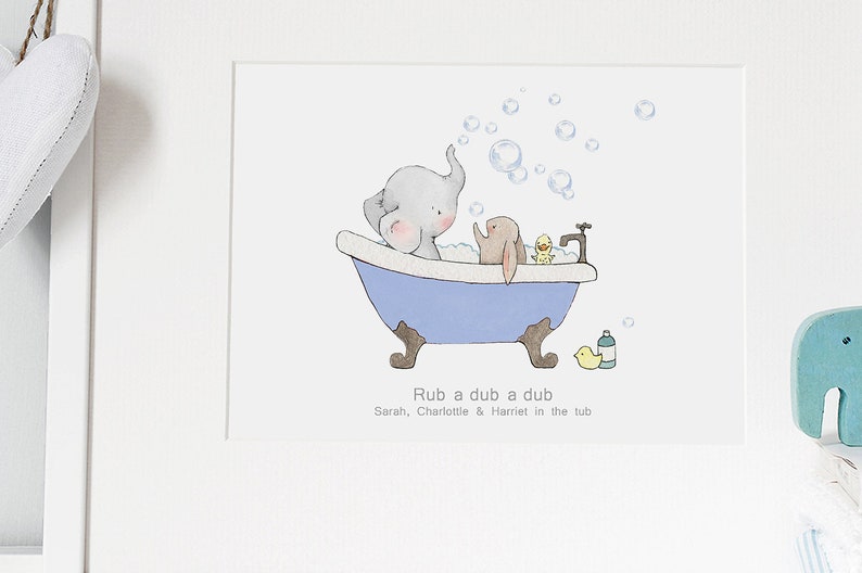 May include: A cute illustration of an elephant and a rabbit taking a bath in a blue bathtub. The elephant is blowing bubbles and the rabbit is holding a yellow rubber duck. The text "Rub a dub a dub" is written below the image, followed by "Sarah, Charlotte & Harriet in the tub."