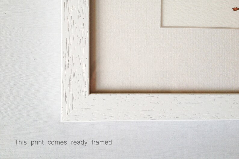 May include: A white wood picture frame with a white mat. The frame has a slightly textured surface. This print comes ready framed.