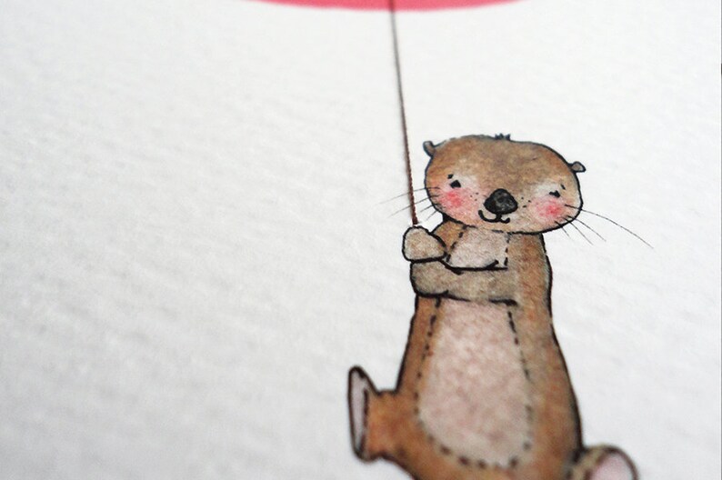 May include: A watercolor illustration of a brown otter holding onto a red string. The otter has a happy expression and is wearing a pink blush on its cheeks.