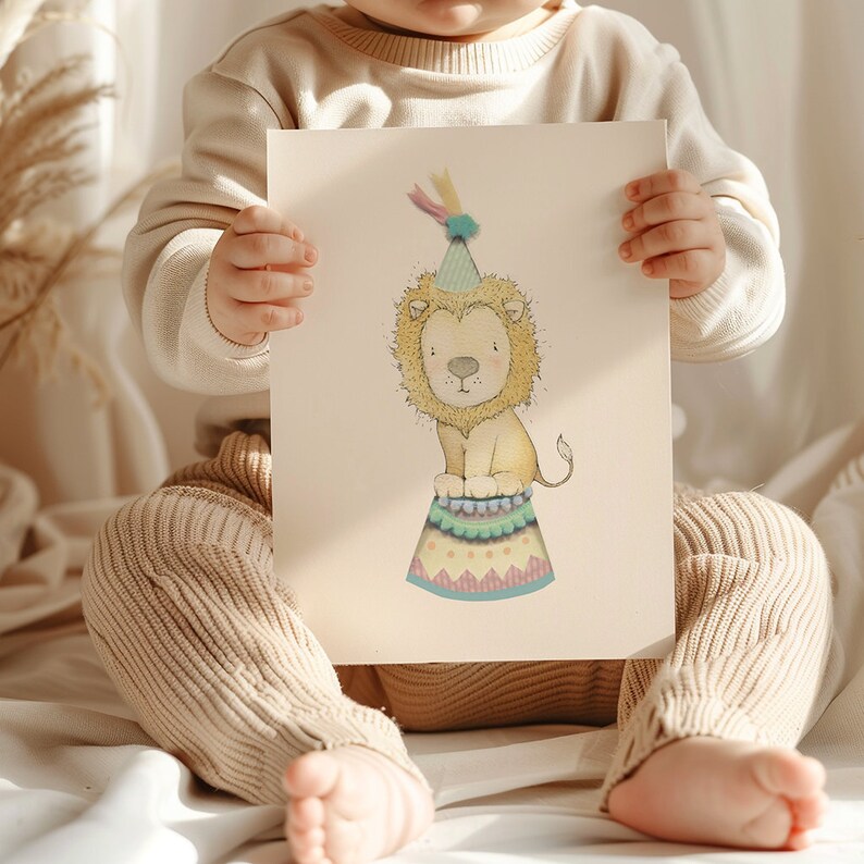 May include: A watercolour illustration of a lion wearing a party hat, sitting on a colourful circus-style platform. The lion has a yellow mane and is depicted in a whimsical, cartoon style. The artwork is on cream-coloured paper.