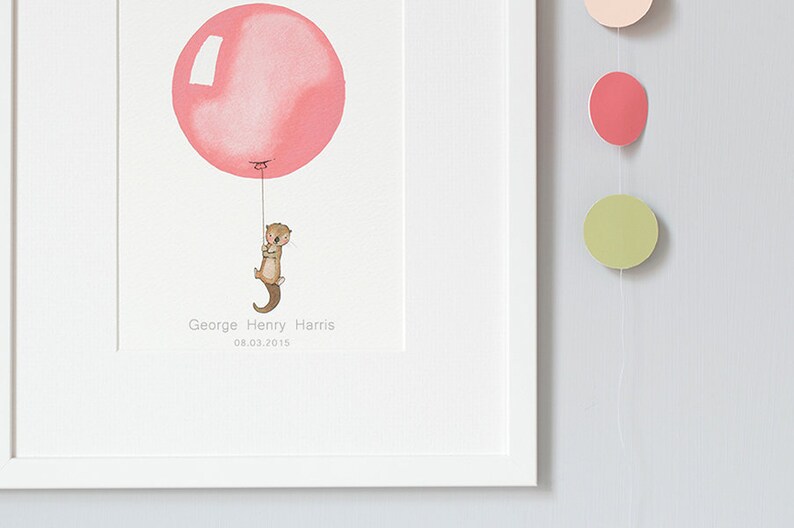 May include: A framed illustration of a brown otter holding onto a pink balloon with the text "George Henry Harris 08.03.2015" below the otter.