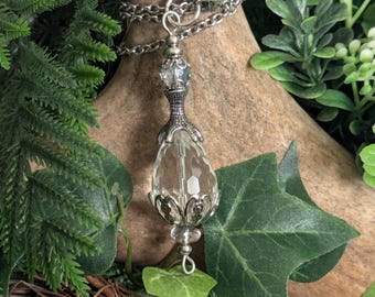 Collar con colgante de garra de dragón de cuarzo cristal facetado y péndulo de acero inoxidable