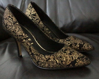 black and gold court heels