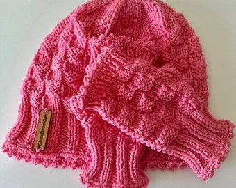 Slouchy pink hat and matching fingerless mitts, hand knit in basket weave stitch, womens size.