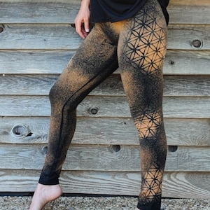 Woman's legging with flower of life designs, sacred geometry patterns bleached with stencils. Mystical symbols, witches, psytrance festival