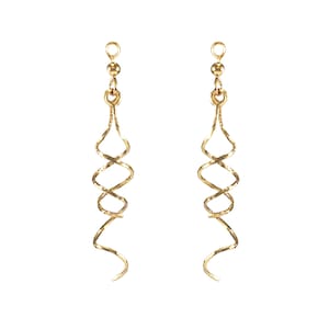 May include: A pair of gold-toned earrings with a spiral design. The earrings are long and dangle.