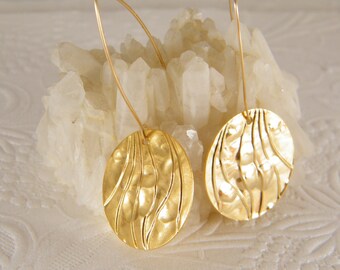 Gold long circle earrings