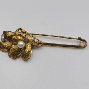 Vintage signed Miriam Haskell safe pin brooch
