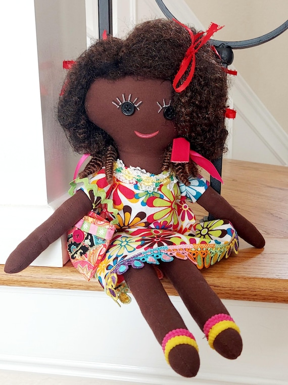 A one-of-a-kind handmade fabric art doll with a distinct personality — the kind of piece you'd find in a small gallery, not a gift shop.