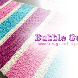 May include: A striped crochet rug in shades of pink, white, and turquoise. The rug is made with a textured stitch that resembles bubbles. The text "Bubble Gum accent rug crochet pattern" is displayed in purple.