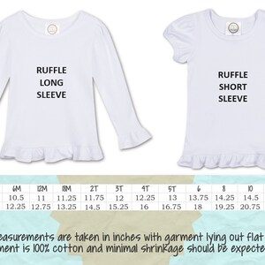 a white shirt with ruffle long sleeves