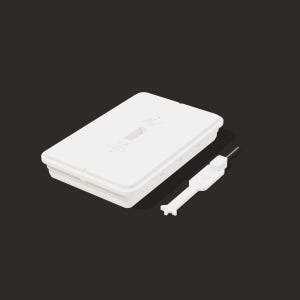 May include: A rectangular white plastic case with a hinged lid and a small rectangular cutout on the top surface. Beside the case lies a white plastic tool featuring a thin metal probe at one end and a multi-pronged tip at the other.