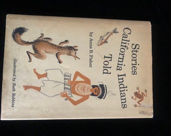 May include: A book cover with the title "Stories California Indians Told" by Anne B. Fisher. The cover features illustrations of a Native American person playing a drum, a wolf, a fish, and a frog.