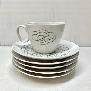 Midcentury Continental China cup and five saucers in the lovely “Script” pattern, designed by Raymond Loewy