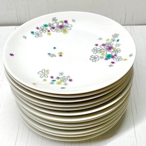 Midcentury Raymond Loewy “Gayety” dinner plates; 14 available and sold separately.