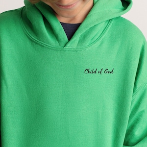 Youth christian kids hoodies for boys, cross on the back and the words "child of God" in the front. The cross on the back has multiple bible verses references.