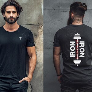 May include: Black t-shirt with a small silver cross on the front and the text "IRON SHARPENS IRON" with a barbell design on the back.