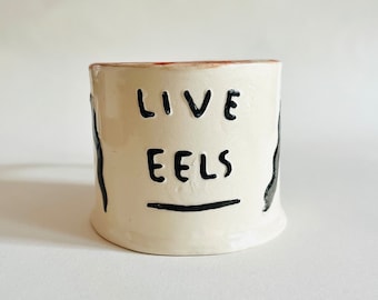 Live Eels ceramic mug