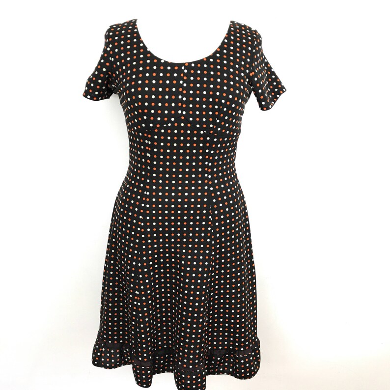 brown and white spotty dress