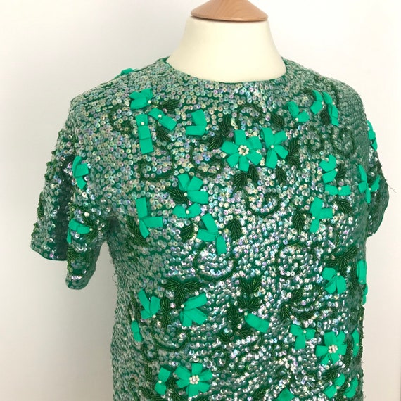 green sequin sweater