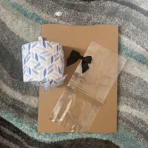 Good Quality Toilet Paper, Matching Bow, wrapped in new gift bag all put in new box. we don’t disappoint!