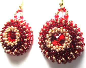 RUBY ROYALTY hand embroidered beaded earrings - ruby colored crystal Rivoli inlay with raised beadwork surround.