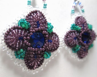 PURPLE BLOSSOMS hand embroidered raised beadwork flower earrings - cobalt glass Rivoli center with raised beadwork surround.