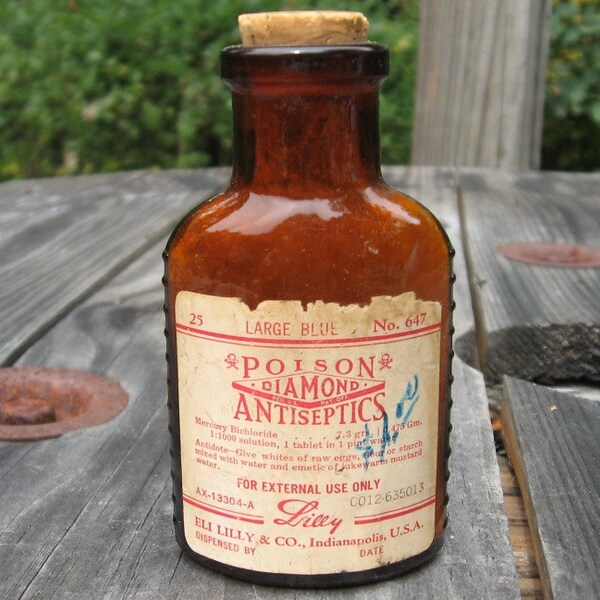 amber poison bottle embossed cork lable vintage contents medicine