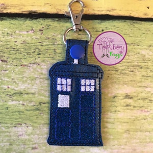 Police box inspired key chain, bag tag, zipper pull