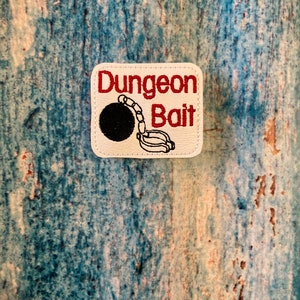 Dungeon bait pin or badge holder