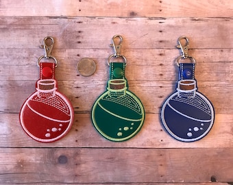 Potion bottle key chain, bag tag, zipper pull