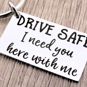 Drive safe, I need you here with me.  New Driver or Professional driver laser engraved Keychain.