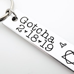 Gotcha Gift, custom with the date of your choice, handstamped keychain with adoption symbol