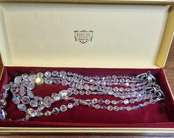 Vintage 4 strand Aurora Borealis (AB) Glass Graduated Necklace. 1950/1960. Boxed