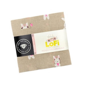 May include: A square charm pack of 42 pieces of tan linen fabric featuring a repeating pattern of white rabbits wearing pink headphones. A black and white paper band wraps around the center with the text LoFi, a linen collection, 5 inches.