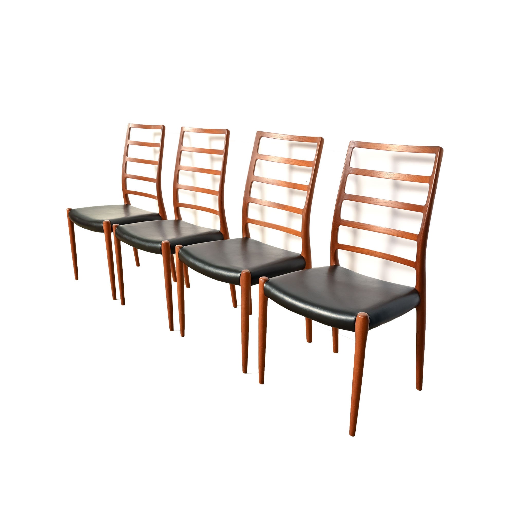 J.L. Moller 4 Teak Dining Chairs Model 82 Black Leather Danish Modern