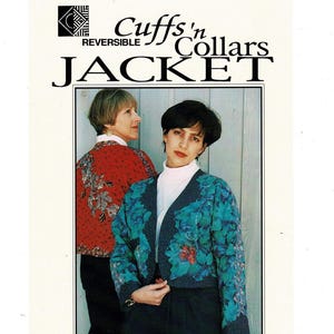 May include: A reversible jacket featuring a teal and blue floral pattern on one side and a red floral pattern on the other. The text Cuffs 'n Collars REVERSIBLE JACKET is printed at the top. The jacket has long sleeves and a collarless neckline.