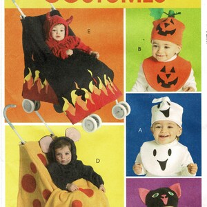 May include: A page of baby Halloween costumes. Featured are a devil costume with a stroller decorated with flames, a pumpkin costume, a ghost costume, and a mouse costume. The costumes are made of felt and fabric.