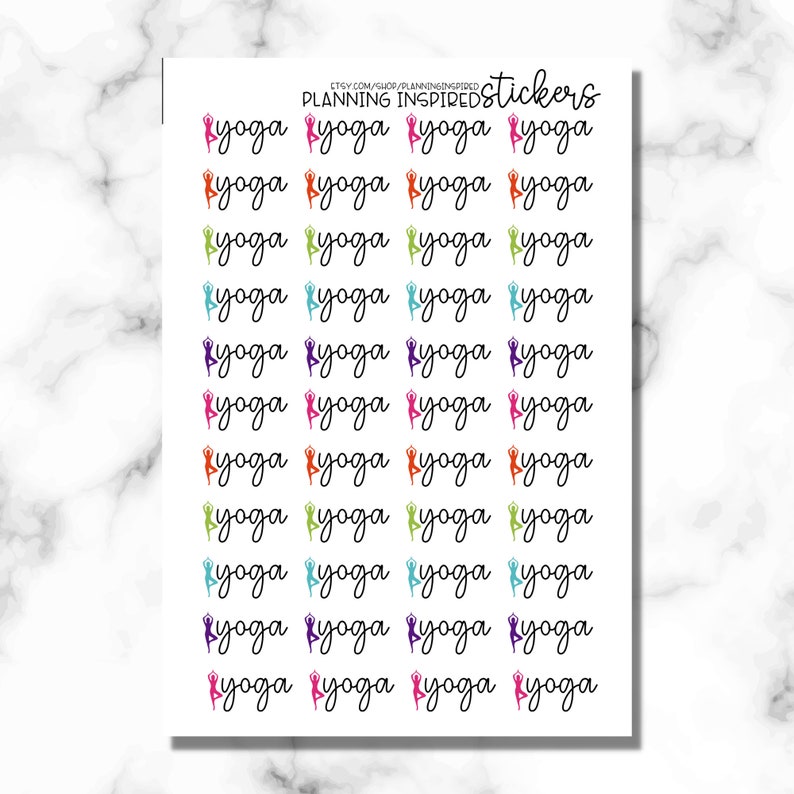 May include: Sheet of stickers with the word "yoga" in a cursive font, each accompanied by a colorful silhouette of a person in a yoga pose. The stickers are in various colors, including pink, orange, green, blue, purple, and black.