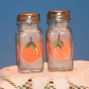 ORANGE SALT and PEPPER shakers