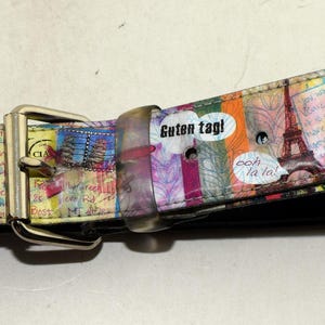 Vintage Y2K 2000s Holographic Womens Jetsetter World Traveler Belt Size Medium - Bonjour, Guten tag, Ciao, Merci, Danke, Rome, London, Paris