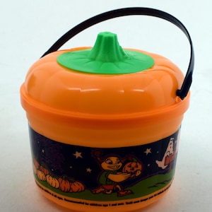 Vintage 1999 McDonalds Halloween Happy Meal Orange Pumpkin Bucket with Green Lid featuring Grimace and Birdie the Early Bird