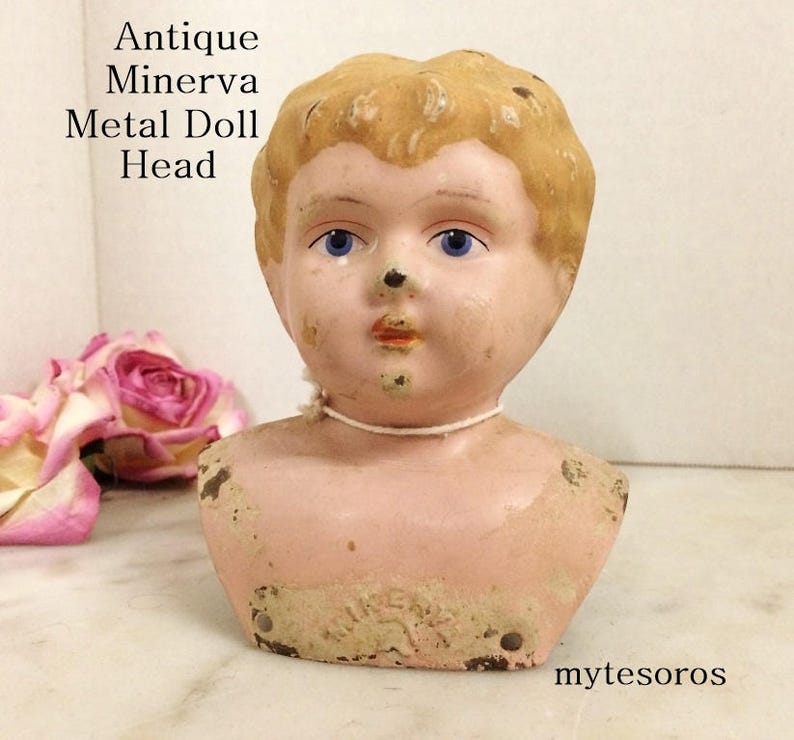 antique metal dolls
