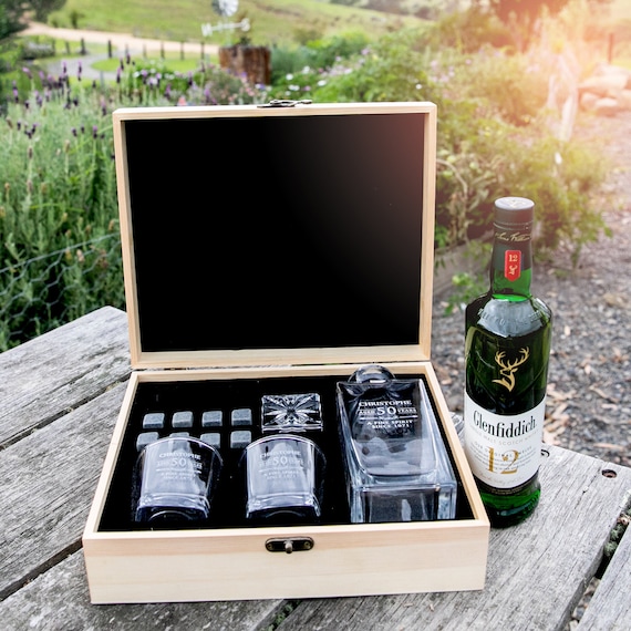 827 favorites on a premium engraved whiskey decanter set in a wooden box — this is the clear category leader and the $210 price point signals real quality and gift gravitas.