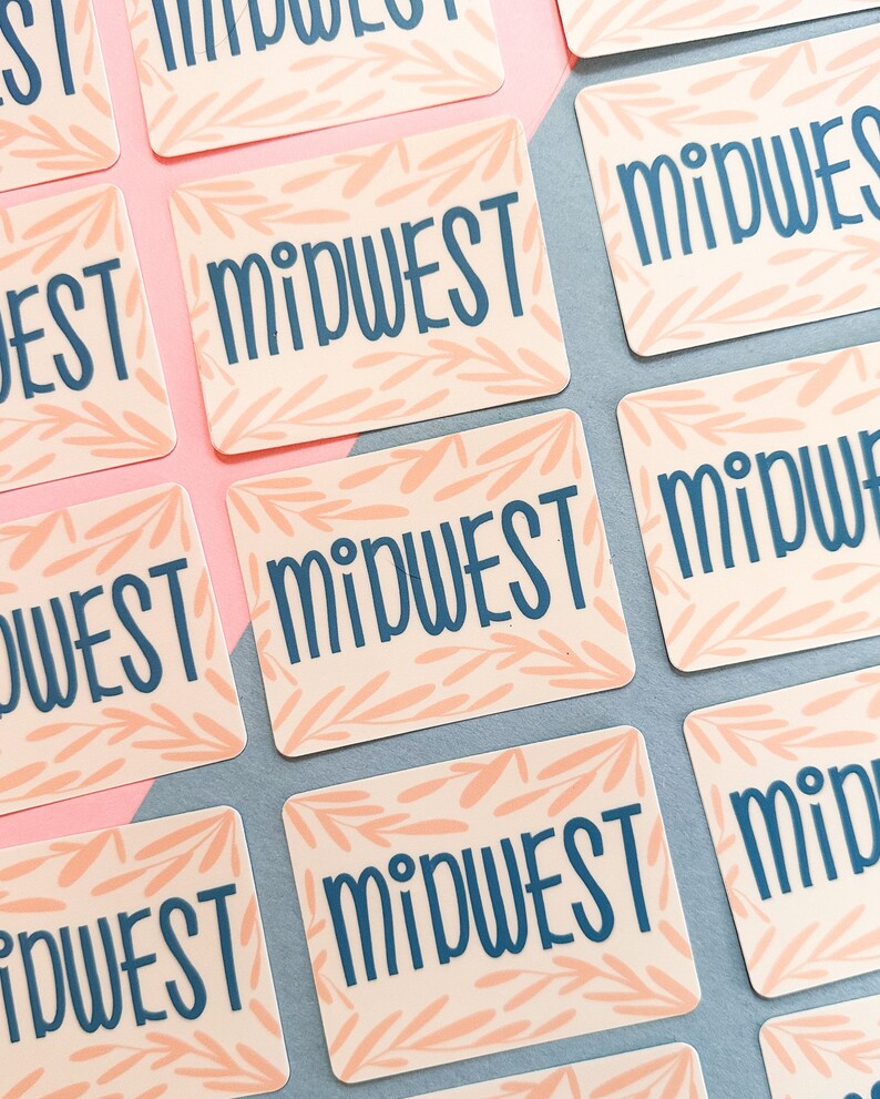 Midwest sticker in cornflower blue on a pink hand-drawn vine background.