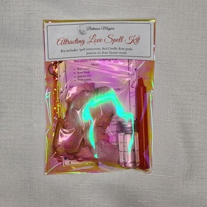 May include: A clear plastic bag containing a love spell kit. The kit includes a red candle, rose petals, jasmine oil, and a rose quartz crystal. The bag has a holographic finish and the text "Attracting Love Spell Kit" is printed on the front.