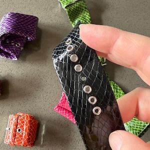 May include: A rustic wooden sign with the text "Welcome to our home" in white lettering. The sign features a distressed finish and a simple, inviting design, perfect for a front porch or entryway.