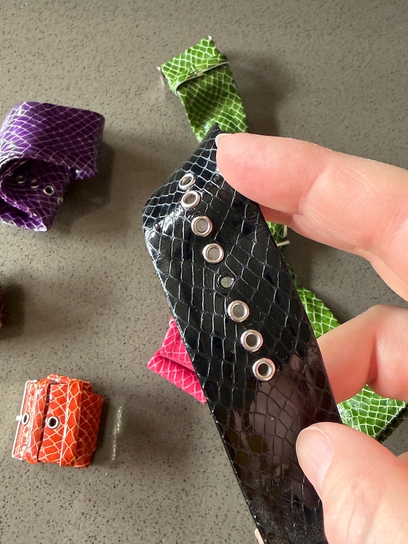 May include: A rustic wooden sign with the text "Welcome to our home" in white lettering. The sign features a distressed finish and a simple, inviting design, perfect for a front porch or entryway.